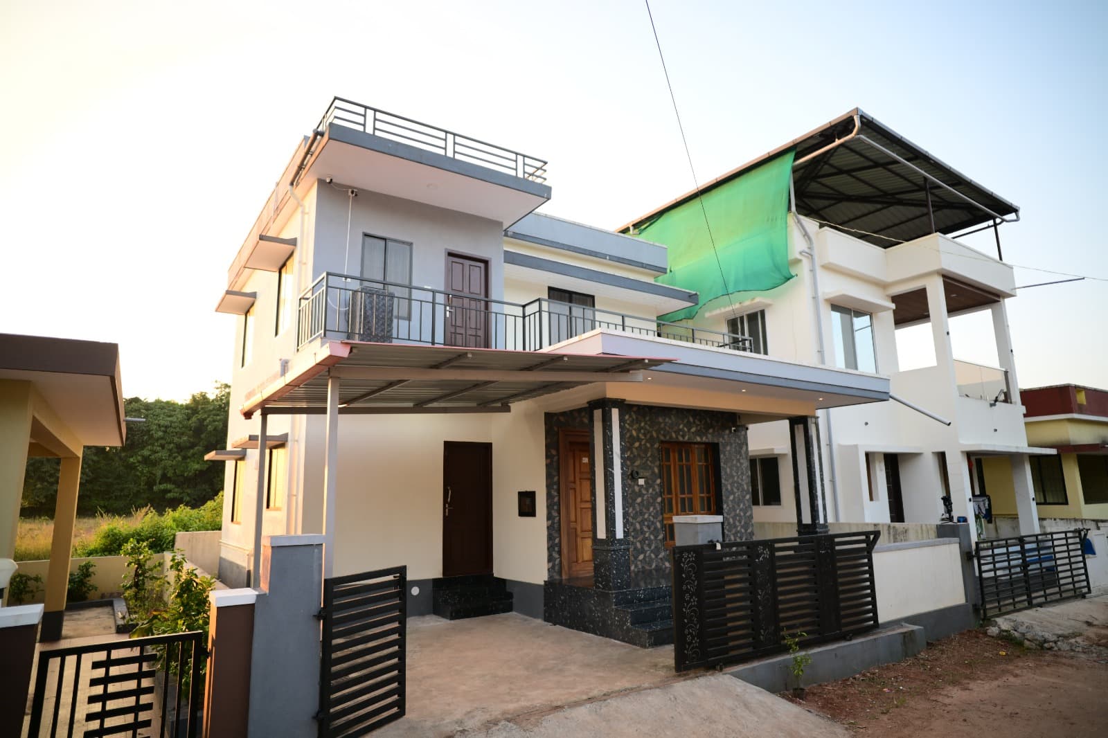 Front view of Runway Retreat with garden and gate